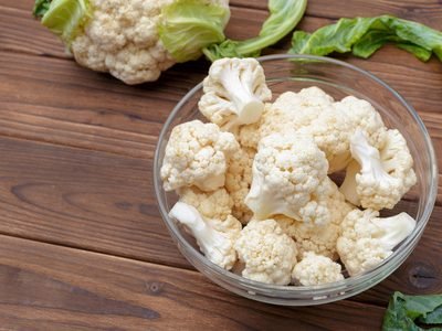 112045451-organic-cauliflower-on-wooden-background